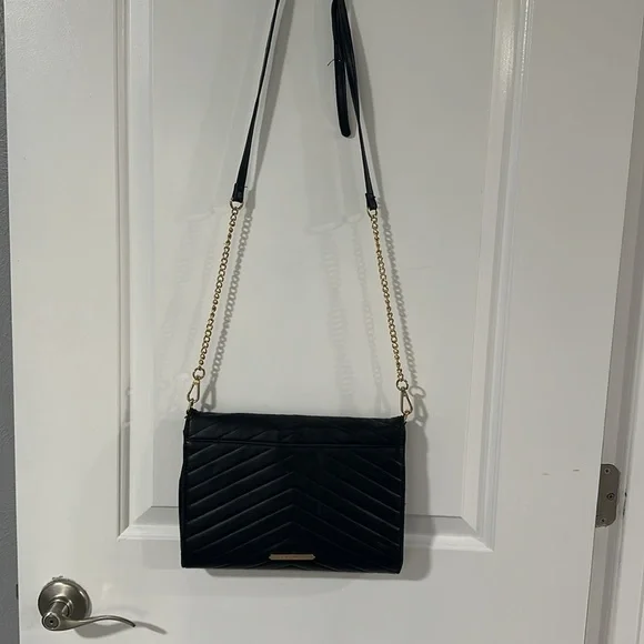 ⭐️SOLD⭐️
Steve Madden Black and Gold Crossbody - Picture 9 of 14